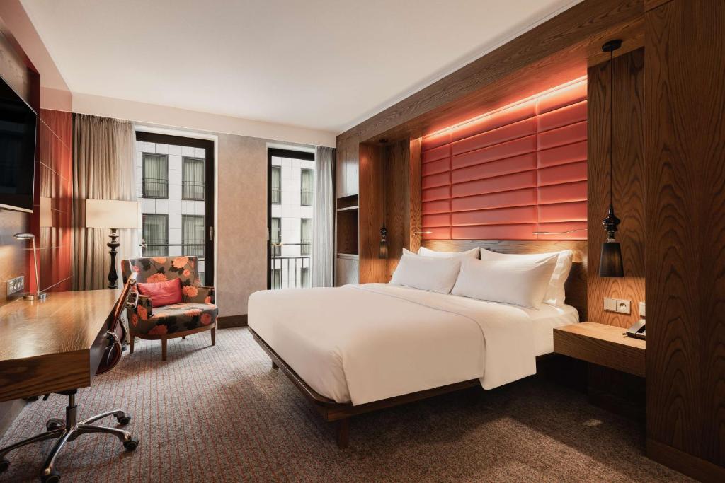 Postel nebo postele na pokoji v ubytování Hilton The Hague