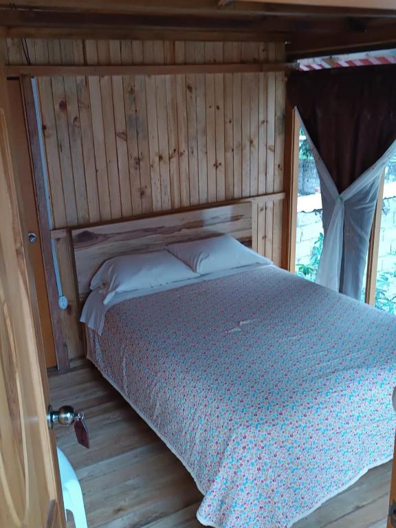 Postel nebo postele na pokoji v ubytování Estancia, CABAÑAS INTAG