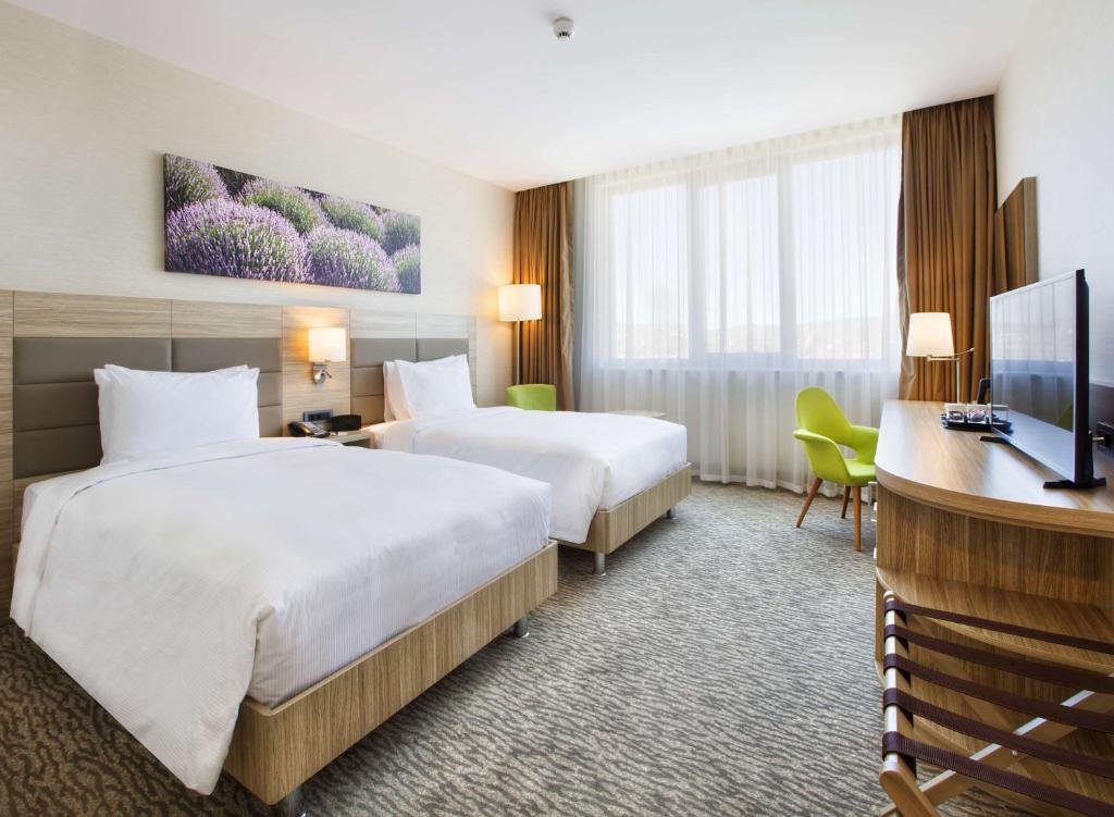 Кровать или кровати в номере Hilton Garden Inn Isparta