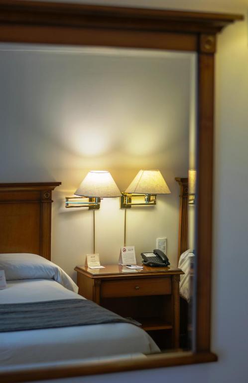 En eller flere senger på et rom på Scala Hotel Buenos Aires