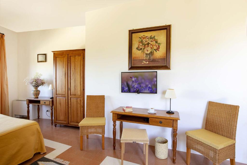 TV a/nebo společenská místnost v ubytování Hotel Baglio Santacroce