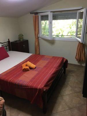 Postel nebo postele na pokoji v ubytování SPIROS APARTMENTS