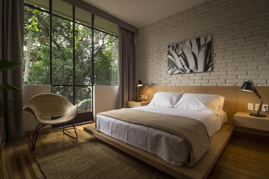 Ένα ή περισσότερα κρεβάτια σε δωμάτιο στο Casa Alfredo