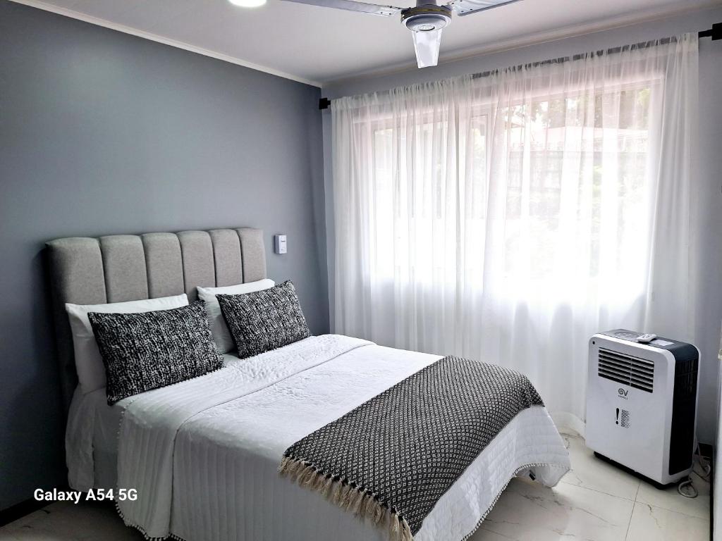 Postel nebo postele na pokoji v ubytování Casa Victoria CR