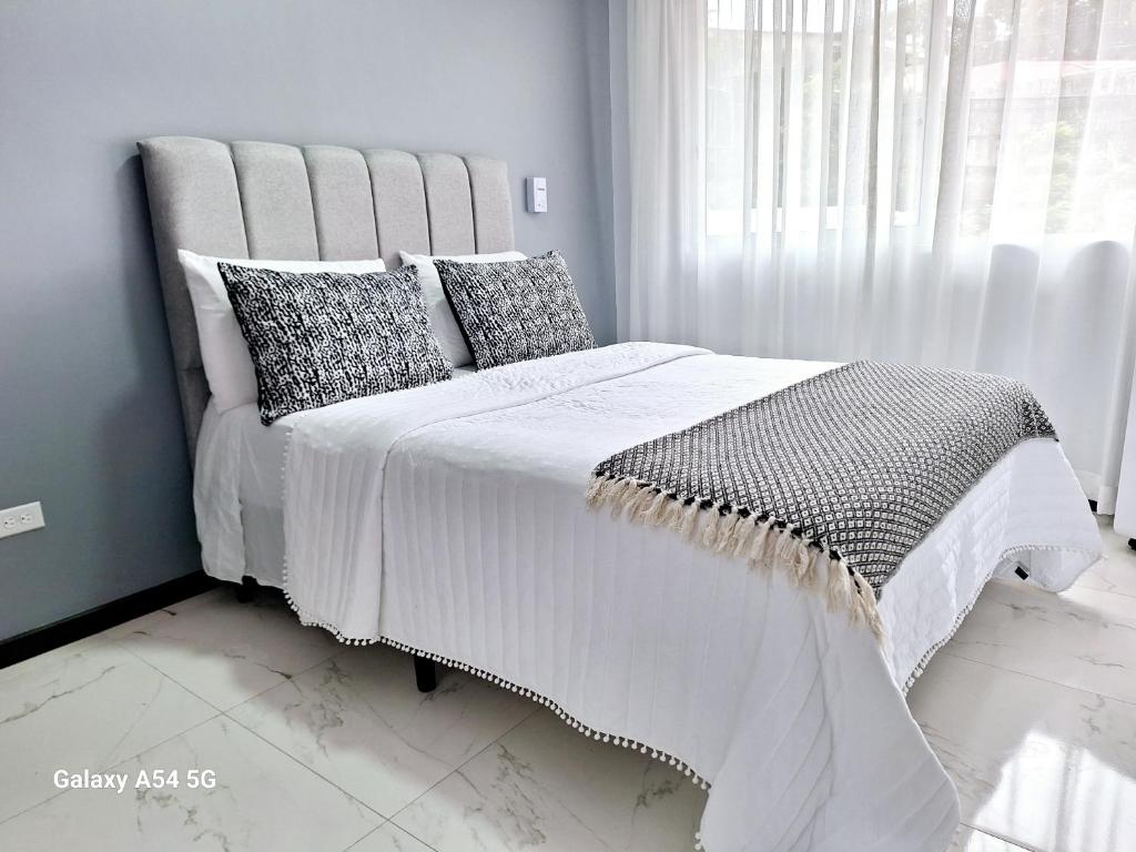 Postel nebo postele na pokoji v ubytování Casa Victoria CR