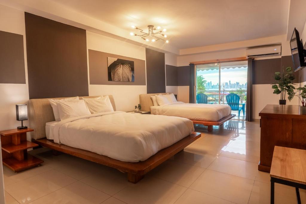 Posezení v ubytování MARINN Tropical Vibes Hotel