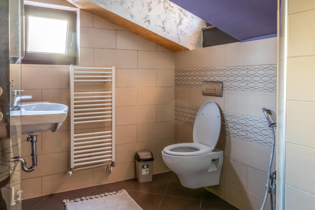 Koupelna v ubytování Aparthotel AA