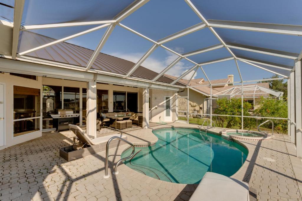 Cape Coral Waterfront Home with Swimming Dock and Pool - Housity