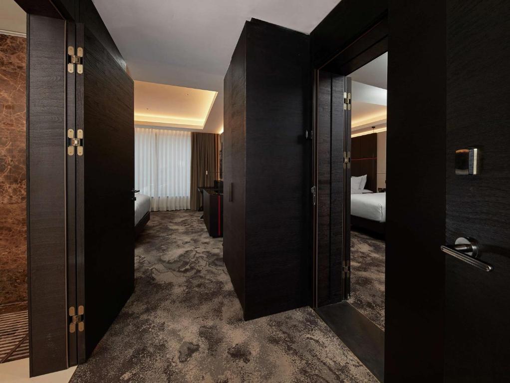 Postel nebo postele na pokoji v ubytování Hilton Belgrade