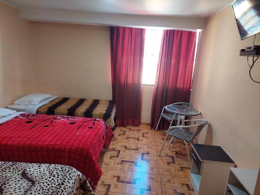 Cama o camas de una habitación en Hotel San Pedro de Palpas