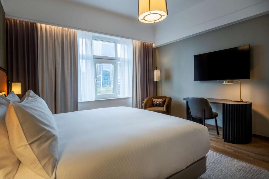 Postel nebo postele na pokoji v ubytování DoubleTree By Hilton Brussels City
