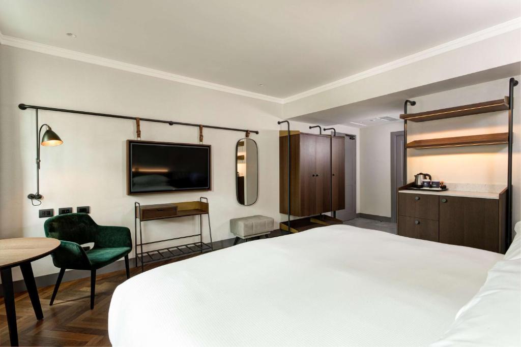 Posteľ alebo postele v izbe v ubytovaní DoubleTree By Hilton Rome Monti