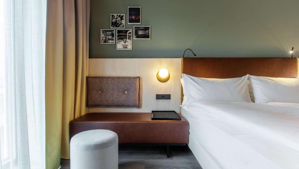 Postel nebo postele na pokoji v ubytování Hilton Garden Inn Mannheim