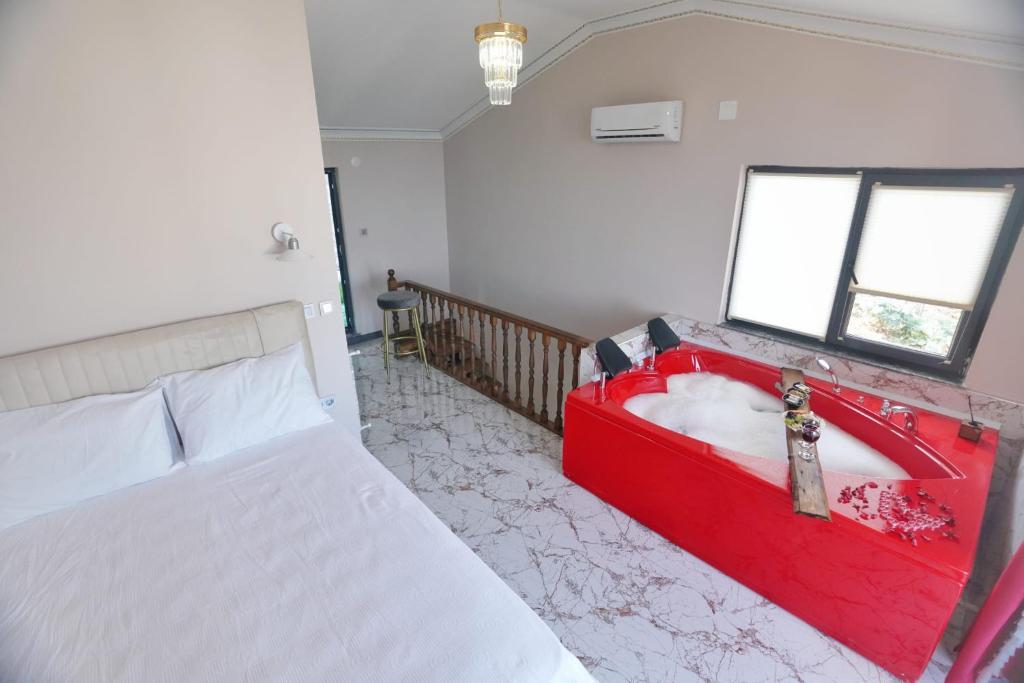 Postel nebo postele na pokoji v ubytování EYLA VİLLA 2