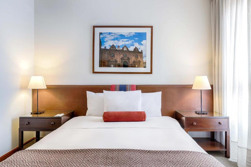Postel nebo postele na pokoji v ubytování LP Los Portales Hotel Cusco