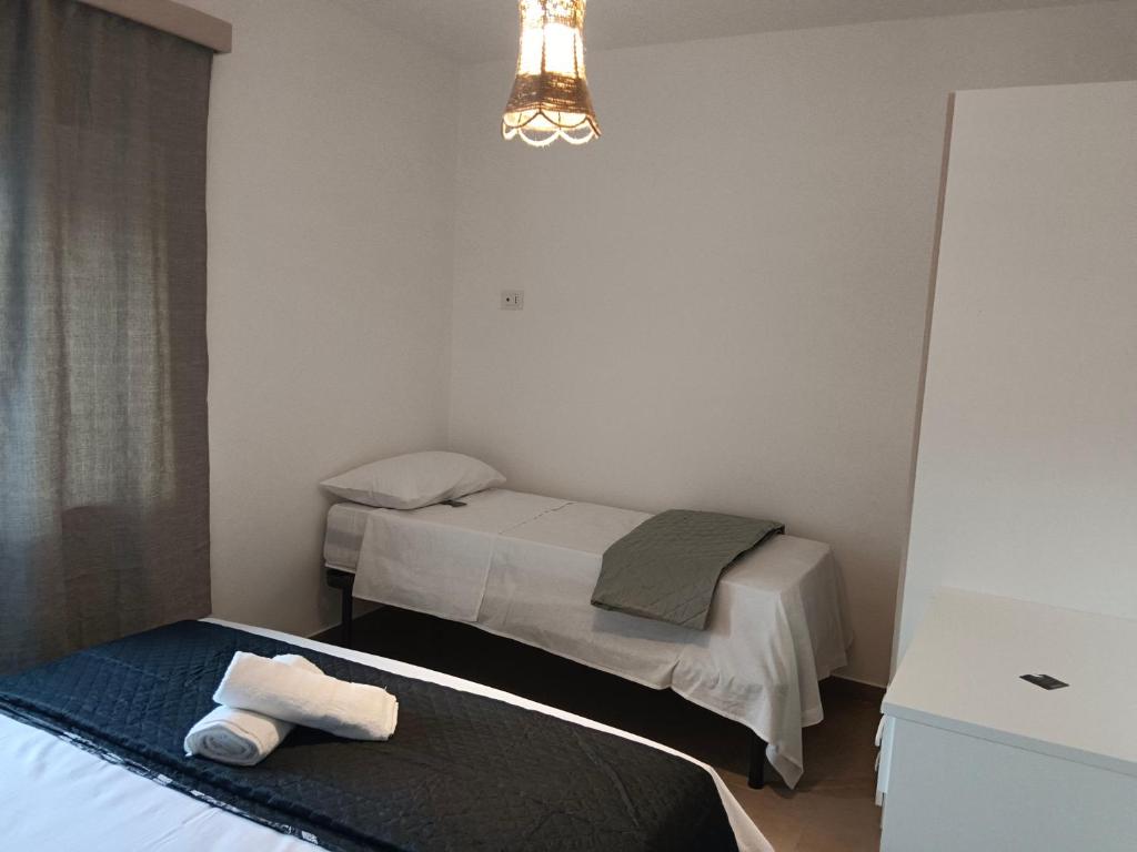 Postel nebo postele na pokoji v ubytování Villa Aurea