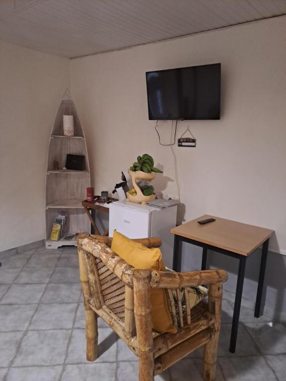TV a/nebo společenská místnost v ubytování La Poz Kreyol Appartement à la campagne