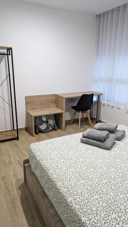 Postel nebo postele na pokoji v ubytování Hydros