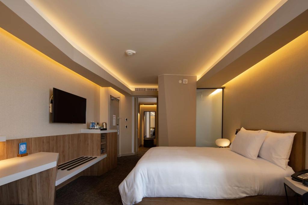 Postel nebo postele na pokoji v ubytování Hilton Garden Inn Lima Miraflores