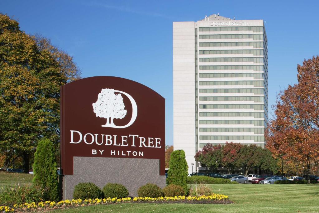 a sign in front of a building at DoubleTree by Hilton Kansas City - Overland Park in Overland Park