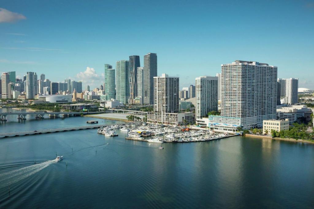 a city with a harbor with boats in the water at DoubleTree by Hilton Grand Hotel Biscayne Bay in Miami
