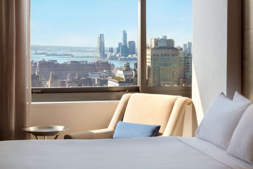 Cama ou camas em um quarto em Hilton New York Times Square