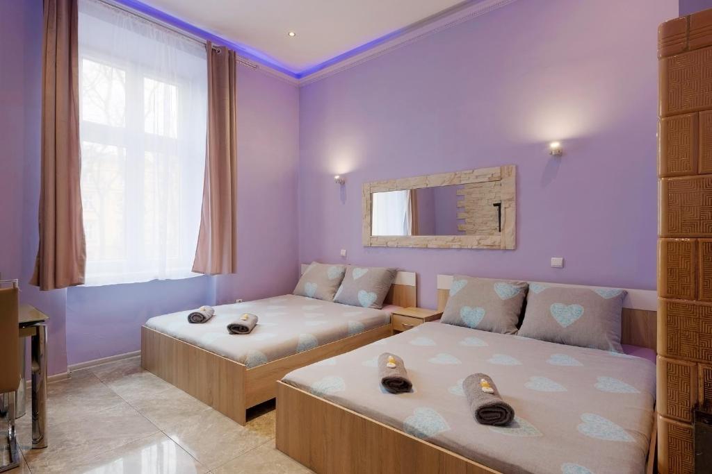 Posteľ alebo postele v izbe v ubytovaní 70s Guest room
