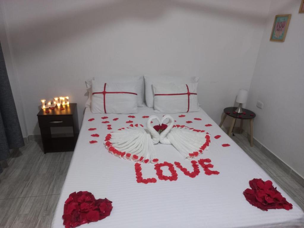 Giường trong phòng chung tại Como en casa