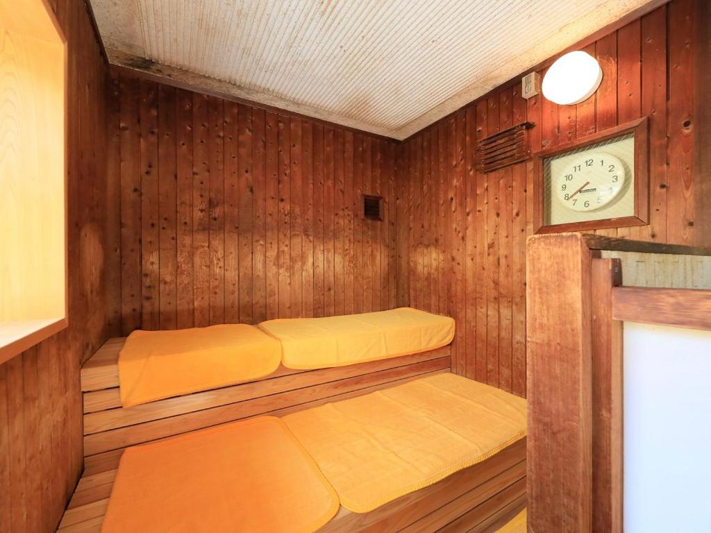 Postel nebo postele na pokoji v ubytování 湯元ホテル阿智川