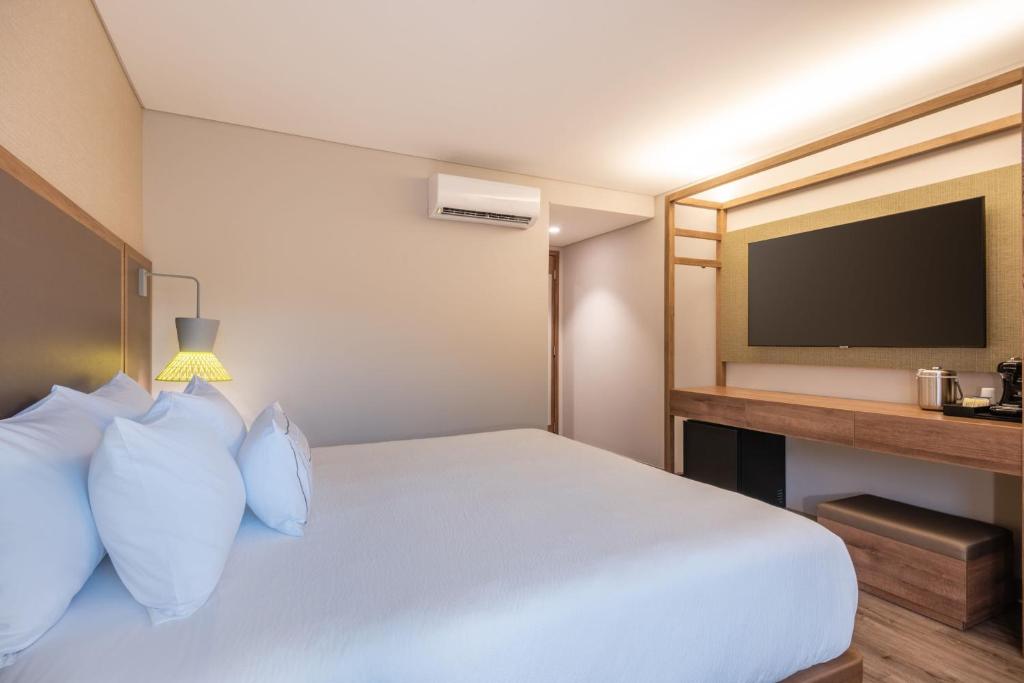 Postel nebo postele na pokoji v ubytování Fairfield by Marriott Medellin Sabaneta