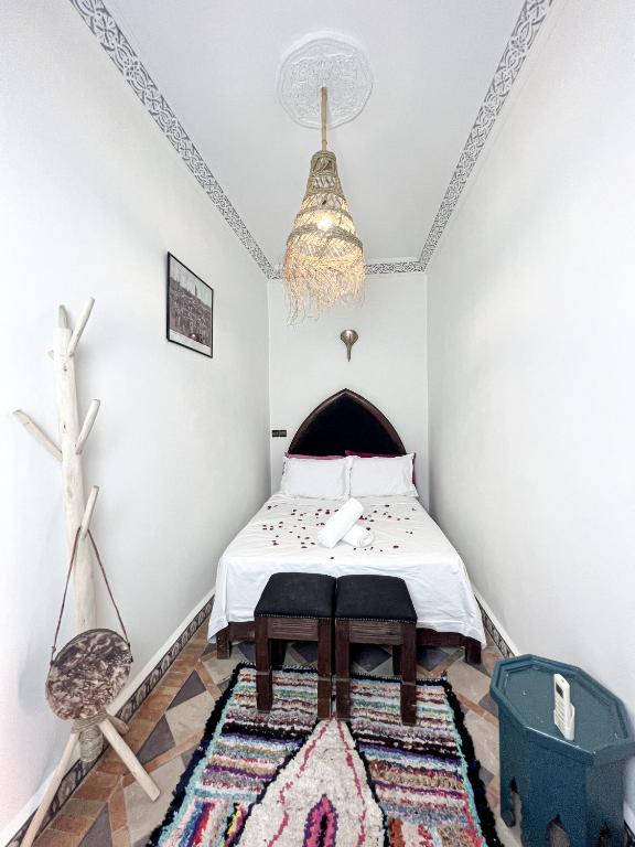 Postel nebo postele na pokoji v ubytování Riad Musa