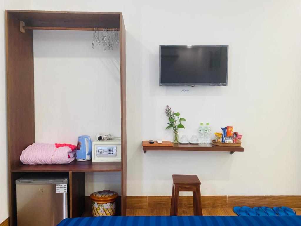 TV a/nebo společenská místnost v ubytování THE VIEW HOMESTAY HỘI AN
