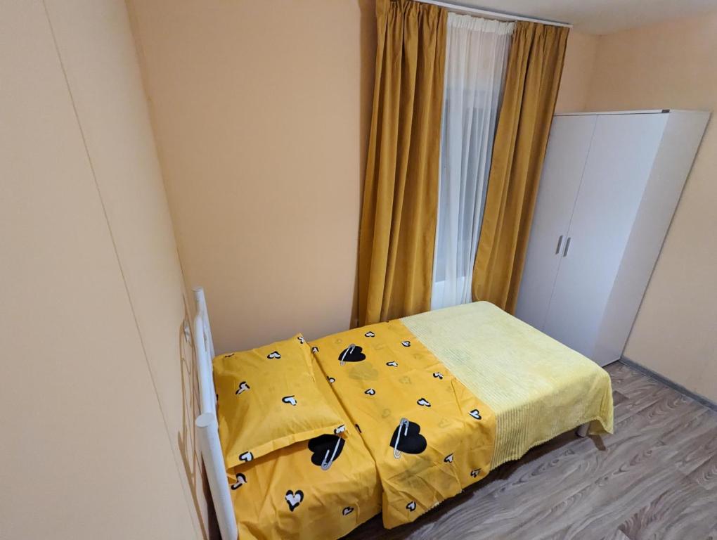 Postel nebo postele na pokoji v ubytování Sunshine Inn Buriani