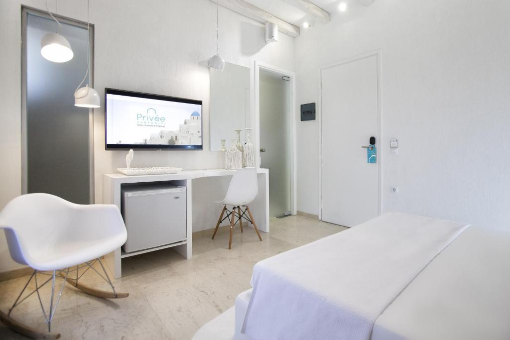 Postel nebo postele na pokoji v ubytování Privée Santorini