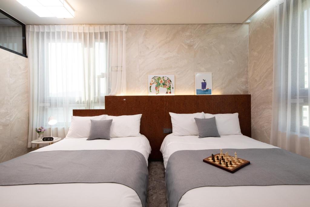 Hotel DMにあるベッド