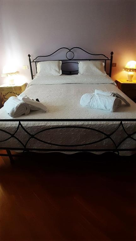 Postel nebo postele na pokoji v ubytování Residence Claudia