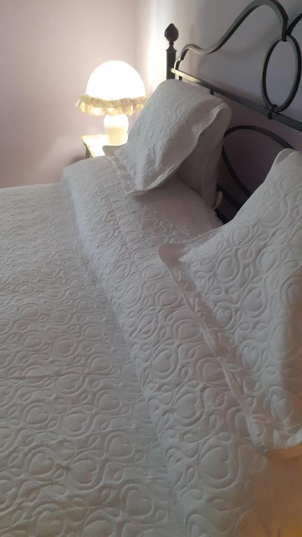Postel nebo postele na pokoji v ubytování Residence Claudia