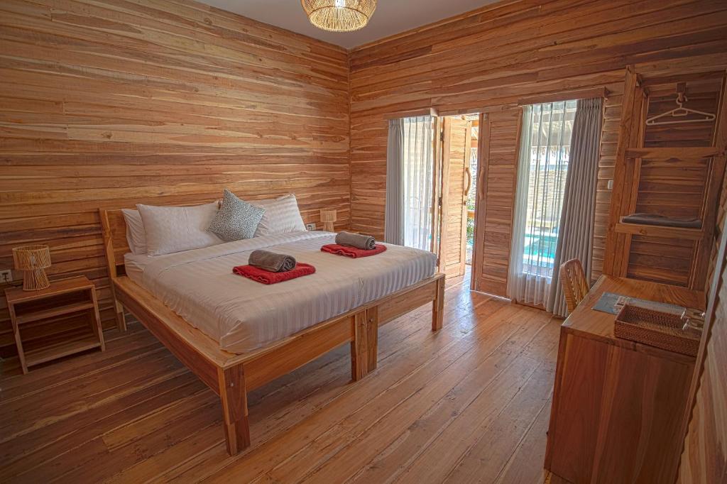 Postel nebo postele na pokoji v ubytování My Island Home Gili Air