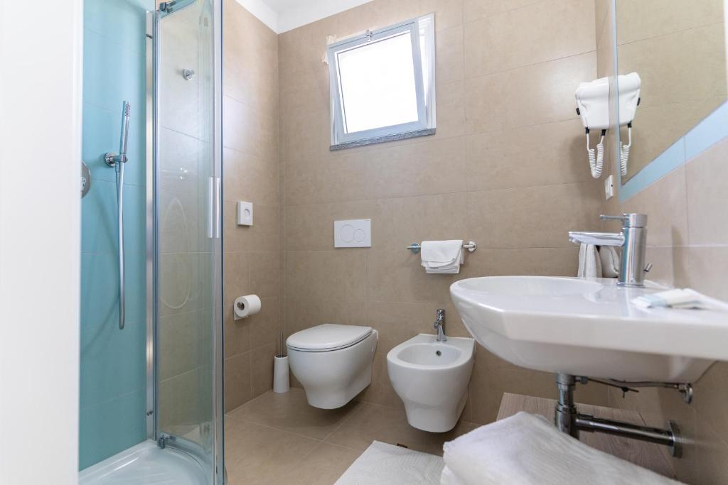 Koupelna v ubytování Hotel Concord