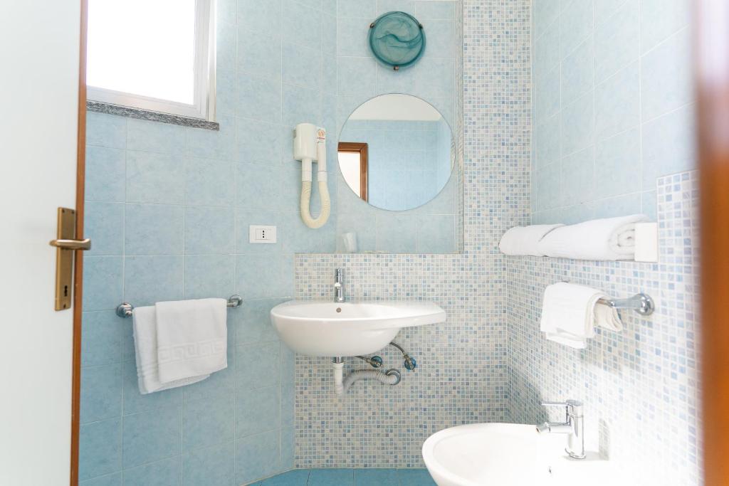Koupelna v ubytování Hotel Concord