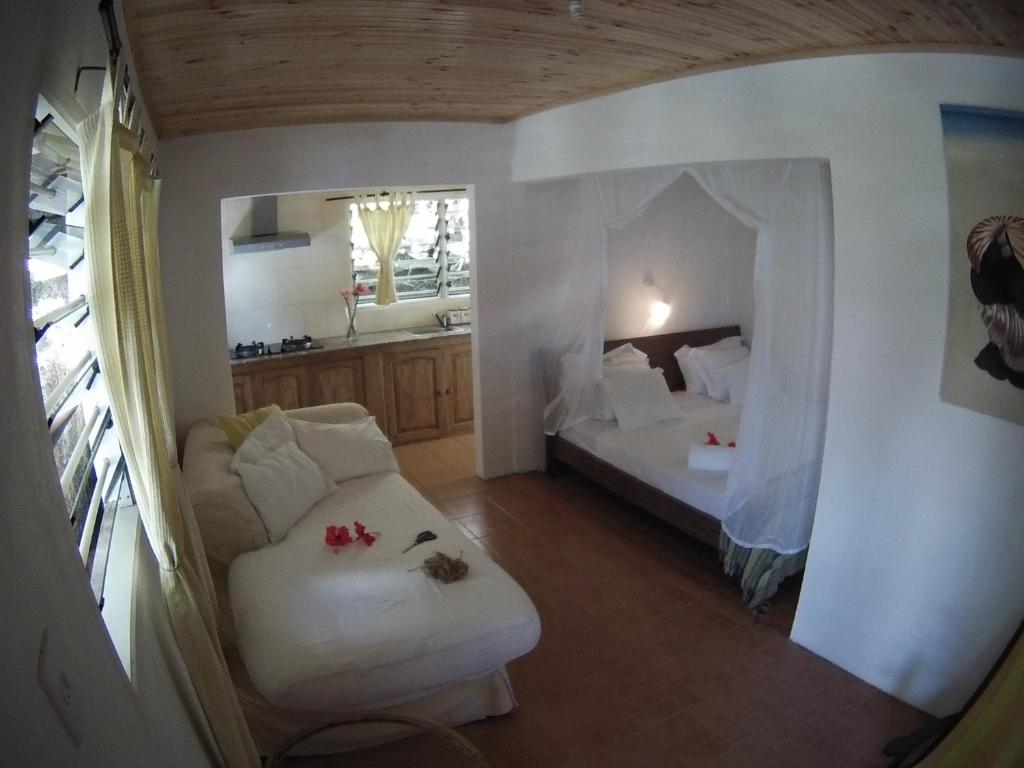 Postel nebo postele na pokoji v ubytování Kokogrove Chalets