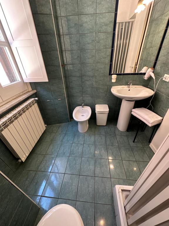 Koupelna v ubytování Hotel Il Papavero