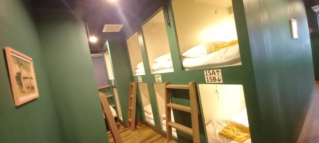 Kuchyň nebo kuchyňský kout v ubytování Wasabi Mita Hotel