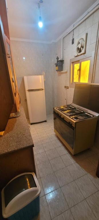 A kitchen or kitchenette at CozyHome 3BR Place Nasr City