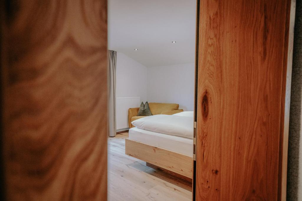Postel nebo postele na pokoji v ubytování Frühstückspension Friedheim