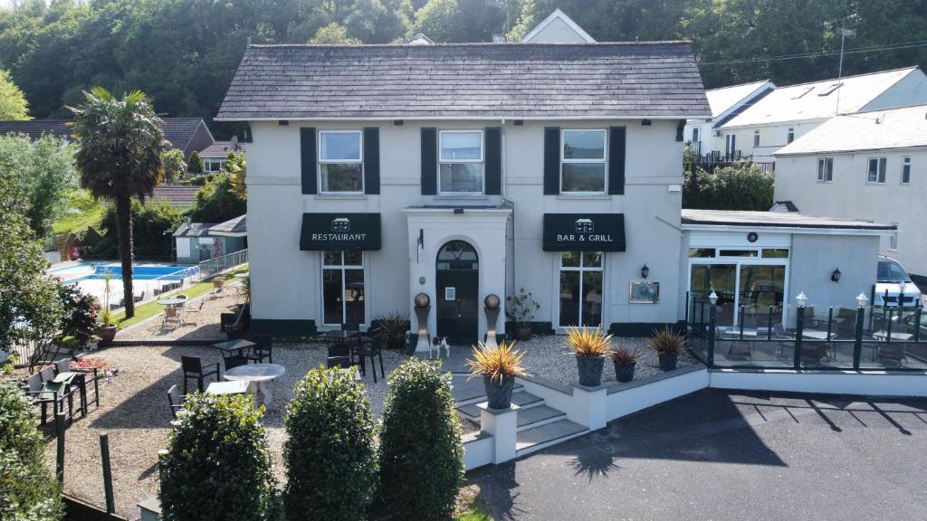 an aerial view of a house with a pool at Fernhill Hotel in Lyme Regis