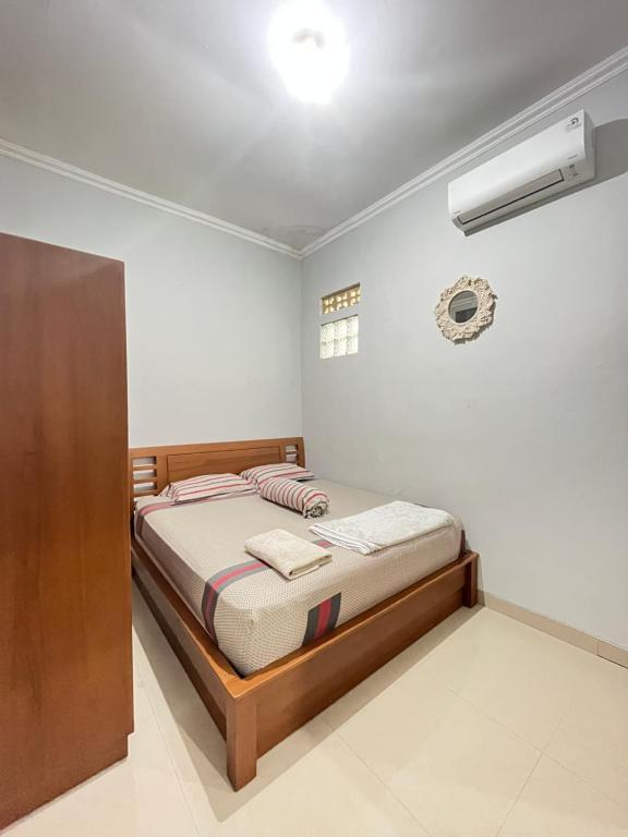 Postel nebo postele na pokoji v ubytování Guesthouse Hannia