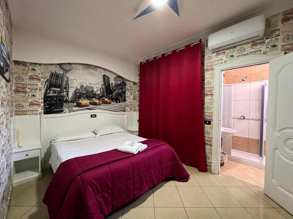 Postel nebo postele na pokoji v ubytování Hotel Tiffany