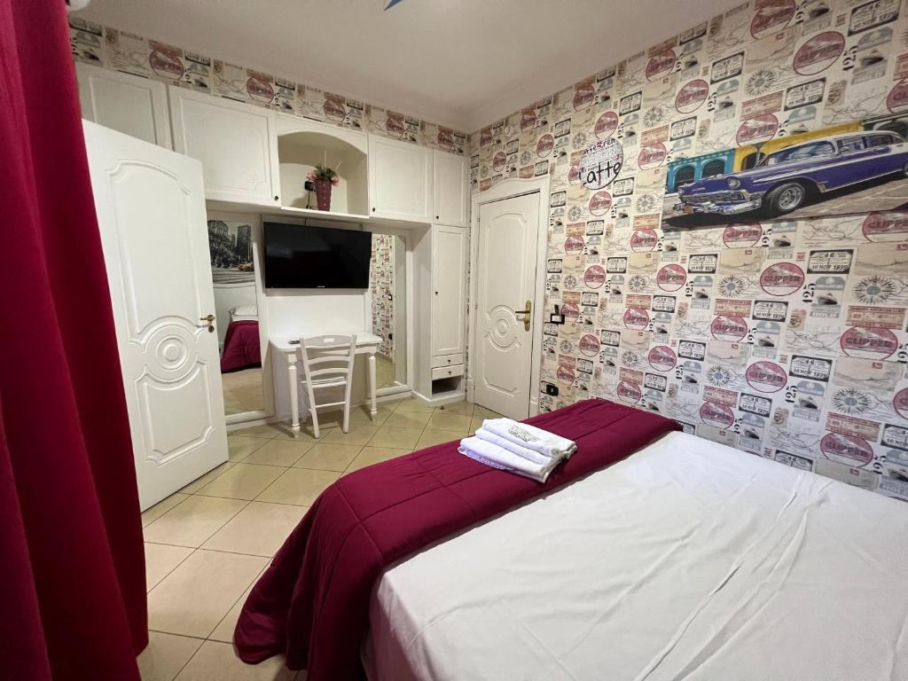 Postel nebo postele na pokoji v ubytování Hotel Tiffany