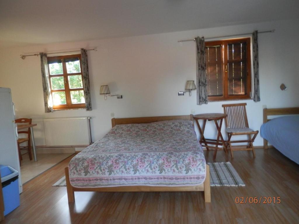 Postel nebo postele na pokoji v ubytování Guest House Spoljaric Sasa